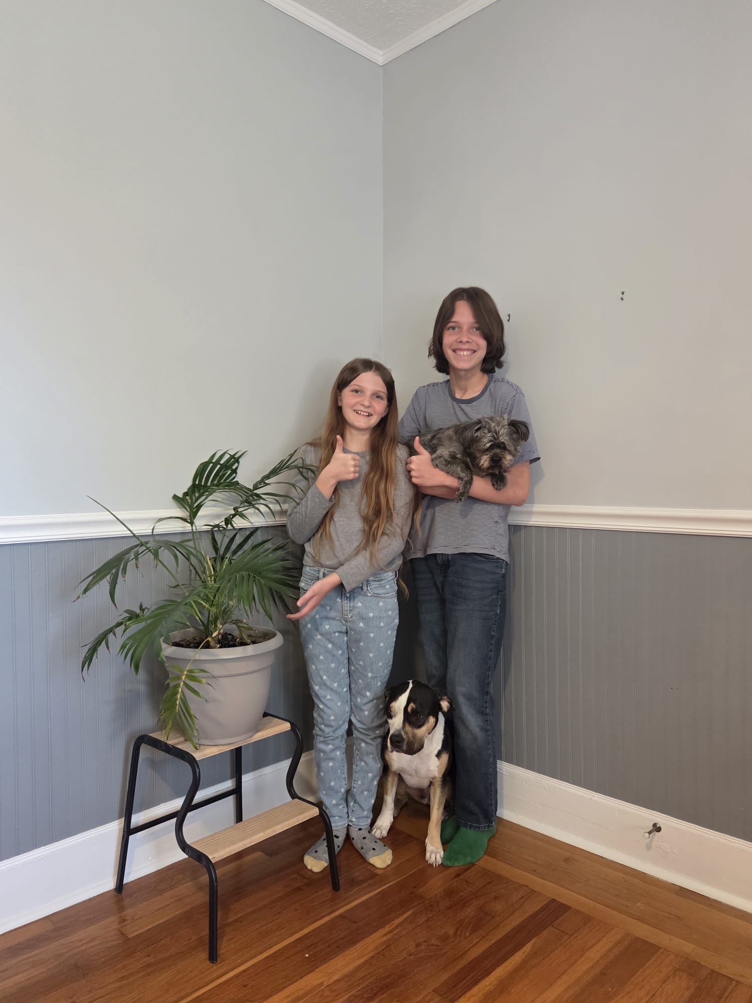 The Avondale Helpers kids with their dog and plant